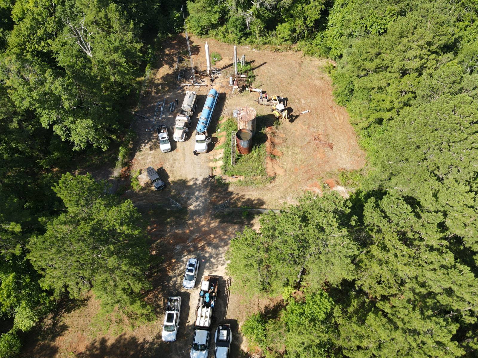 Aerial drone view of a Norwood Energy well site with service equipment on location